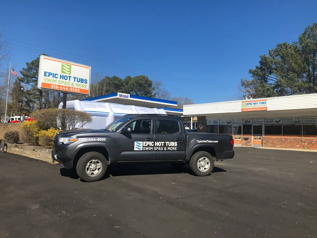 Epic Hot Tubs service truck parked outside the Durham showroom