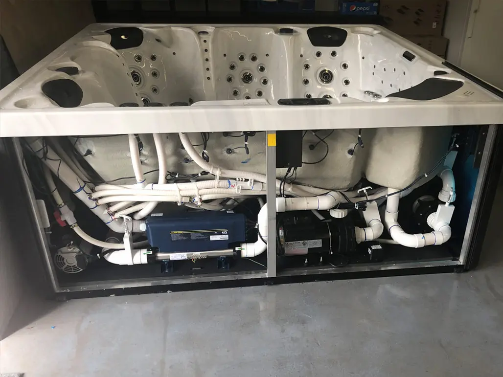 Hot tub service access to pumps, heater, and plumbing