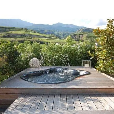 Amore Bay hot tub recessed into a wood deck