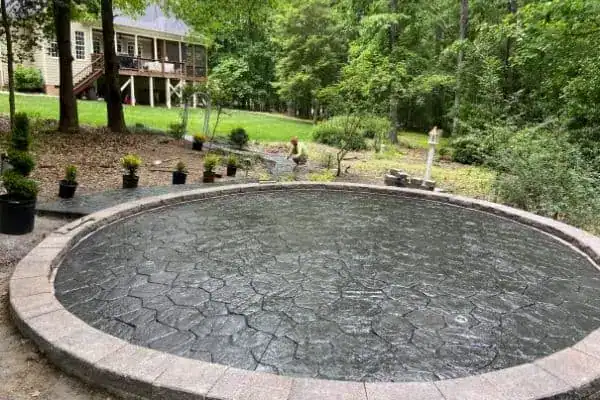 Concrete pad for a hot tub in a backyard