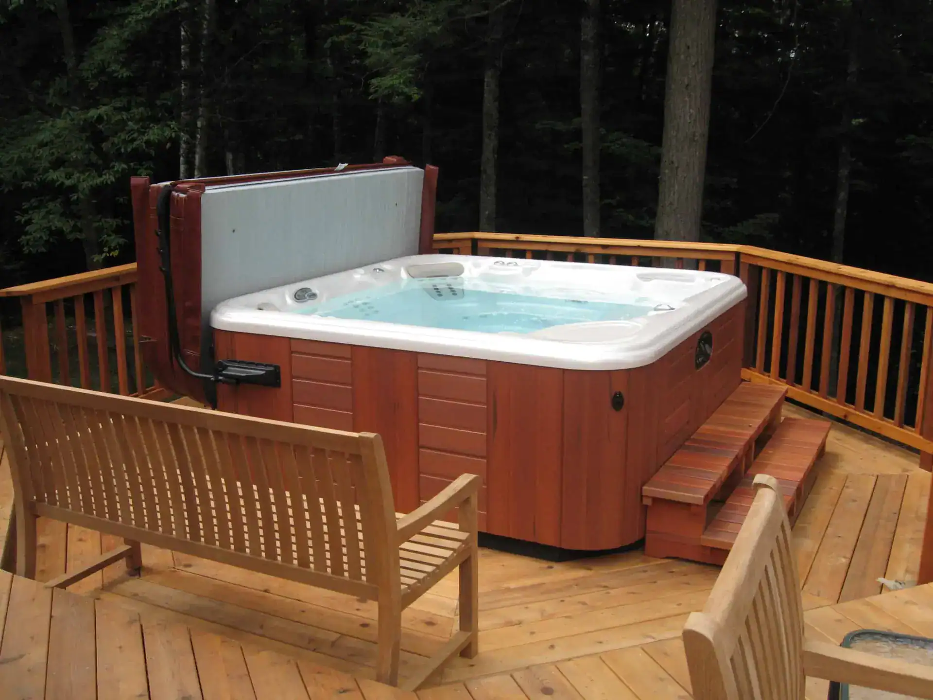 hot tub built into a wooden deck