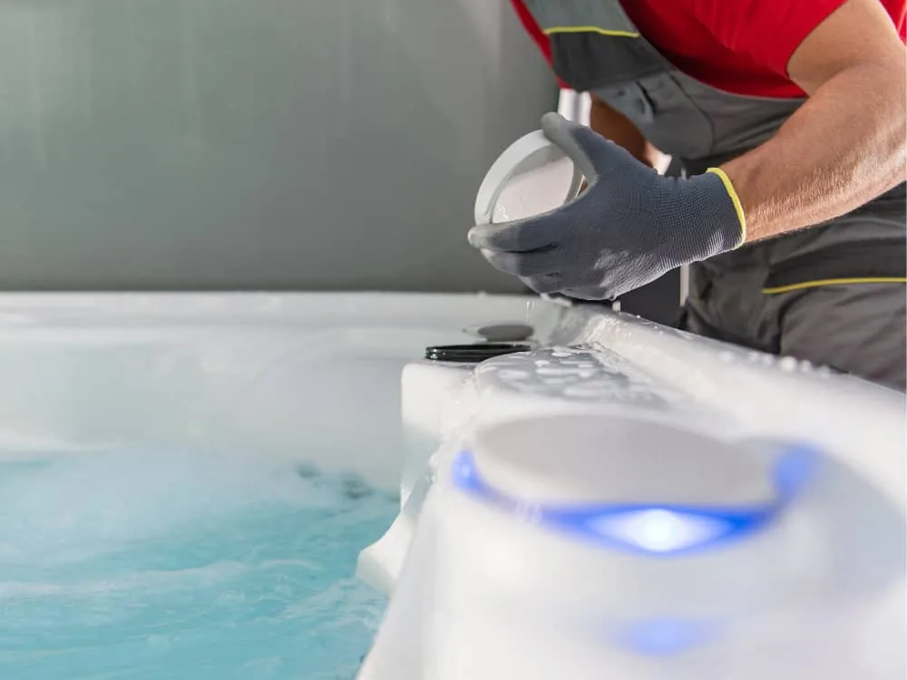 Cleaning a hot tub filter to reduce hot tub maintenance costs