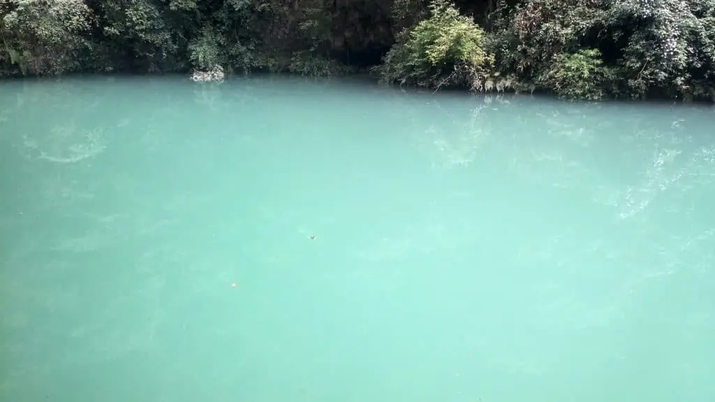 Milky, cloudy water surface showing what murky hot tub water looks like