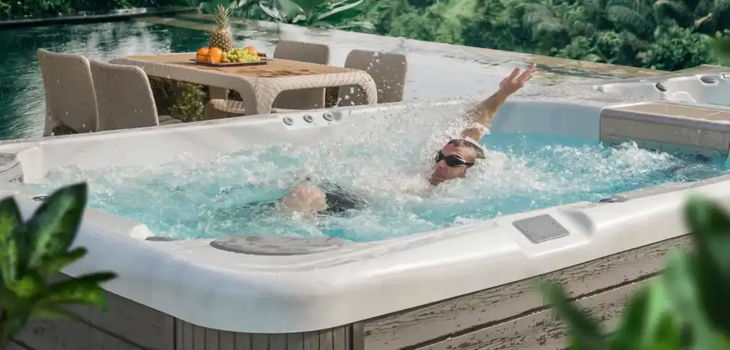 woman using a swim spa for physical therapy